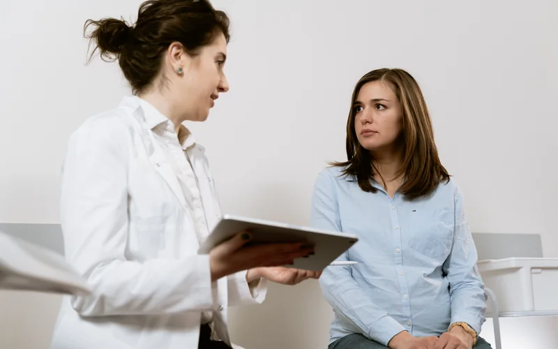 Couple reviewing IVF loan application documents