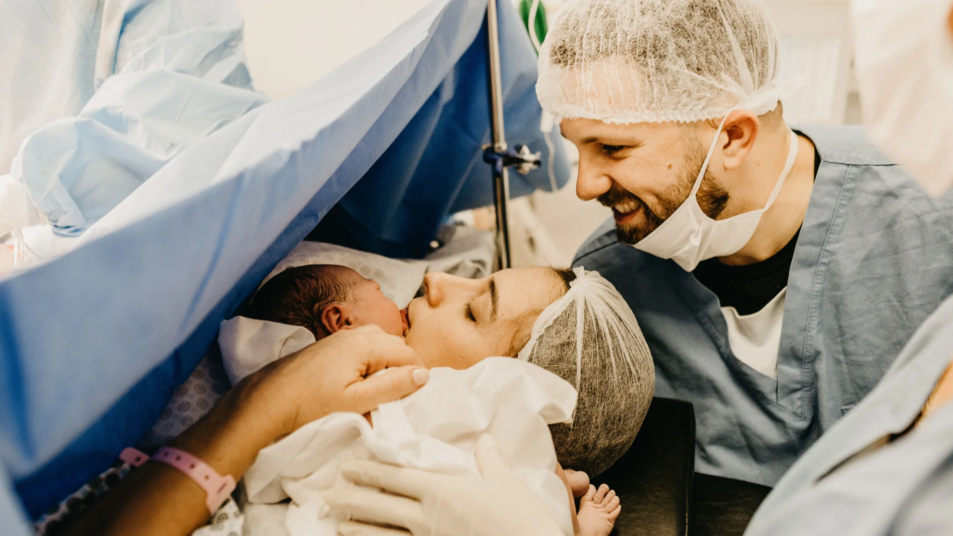 Happy family with newborn baby after successful IVF treatment