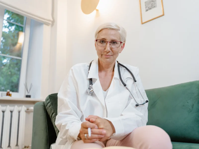 Fertility specialist consulting with patient about financing options