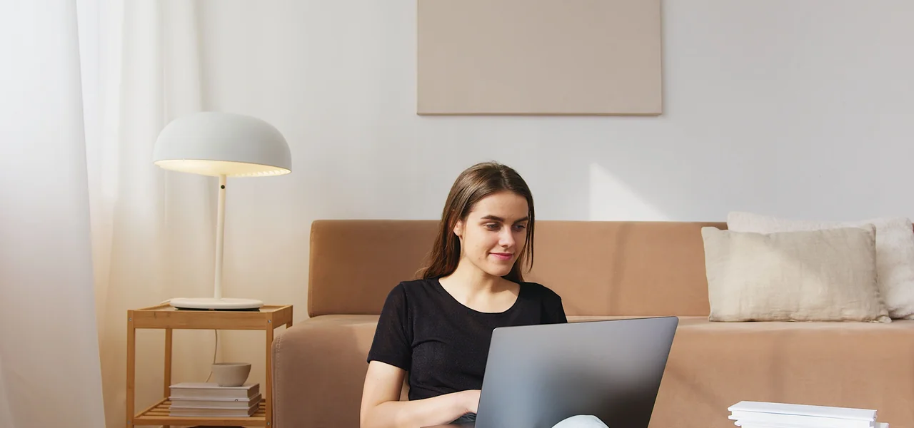 Woman submitting fertility financing application online